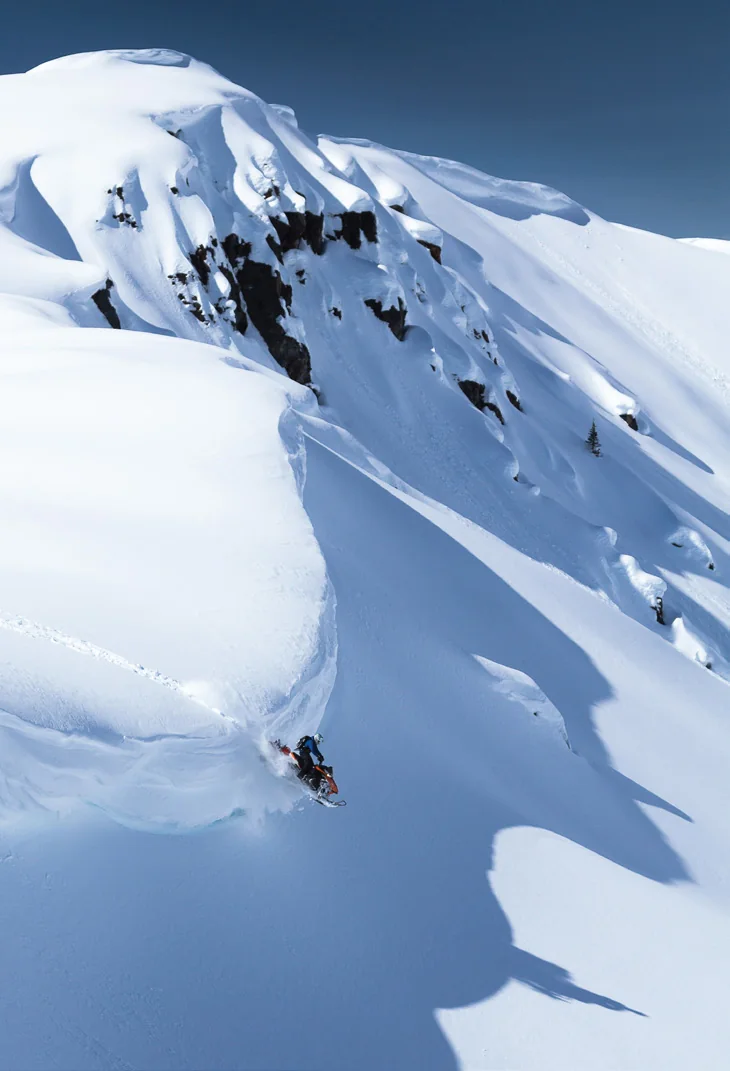 Snow-covered peaks above the Foggy Day riding area